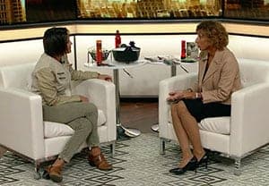 Julie Weber, Director of the Missouri Poison Center, being interviewed by a KSDK host in a television studio setting.