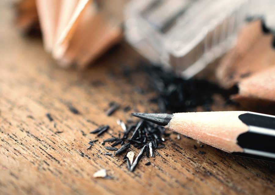 Shavings of pencil lead from a pencil sharpener.