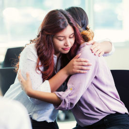 two people hugging