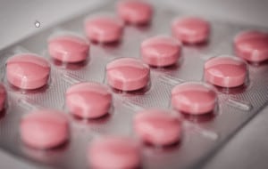 A blister pack of pink round tablets, representing prescription buprenorphine pills.