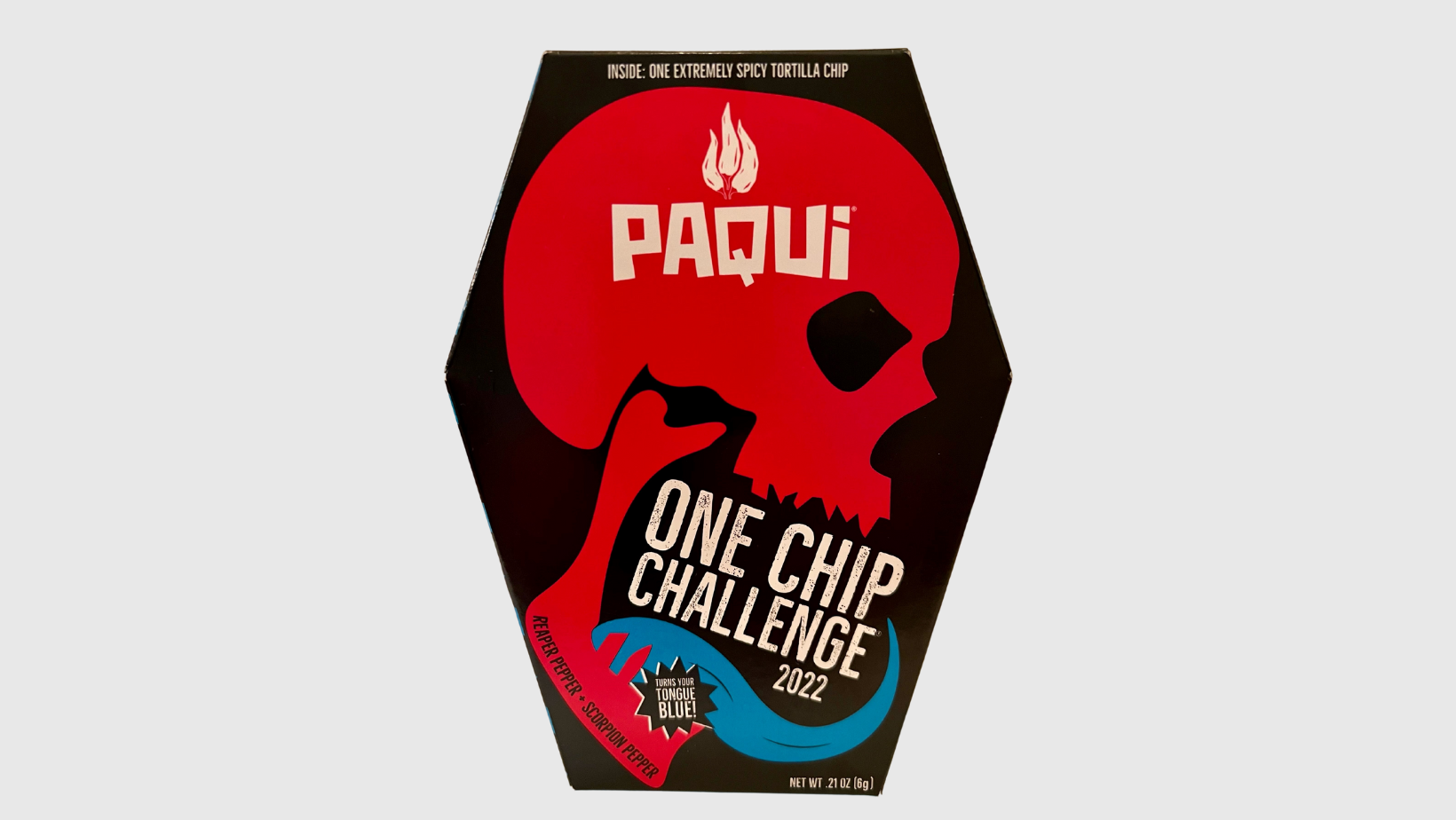 Paqui One Chip Challenge 2022 packaging — a coffin-shaped black box featuring a red skull and flame logo