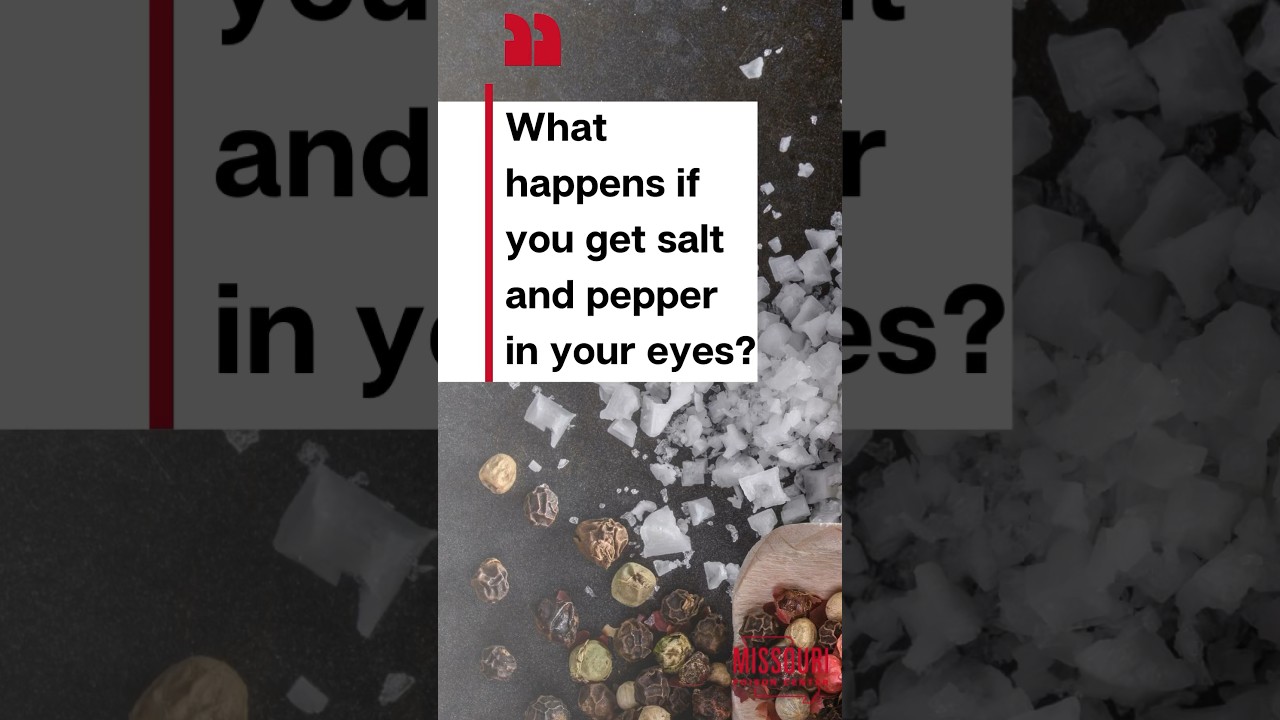 Salt and pepper on a black table