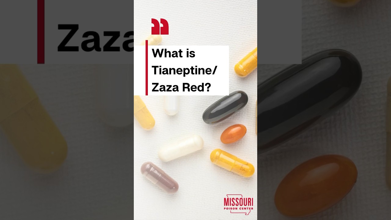 Different colored pills scattered on a white table